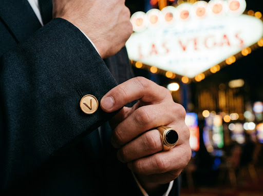 Close up of a luxury suit and gold cufflinks